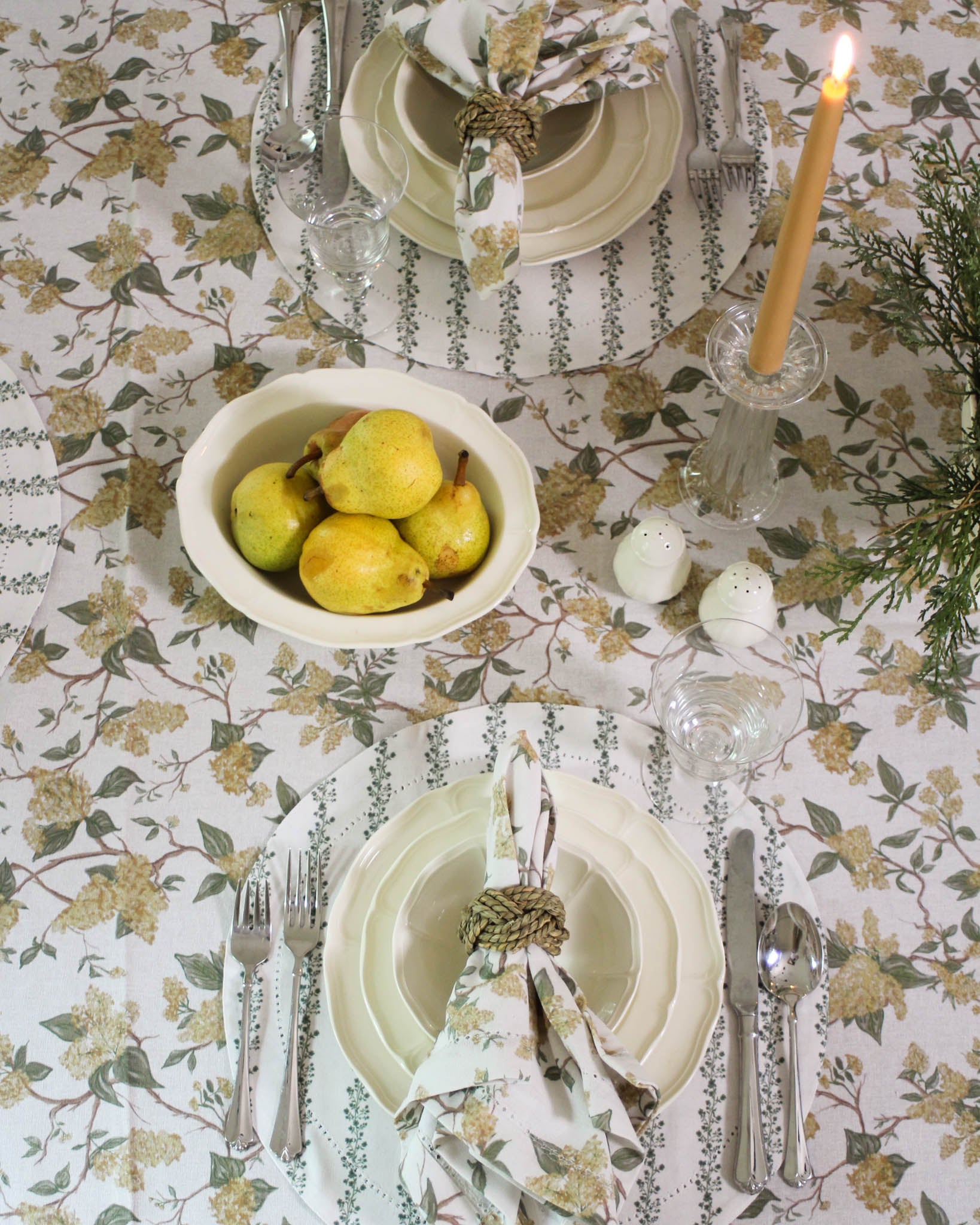 Sustainable organic cotton floral tablecloth in warm tones for Thanksgiving and holiday gatherings