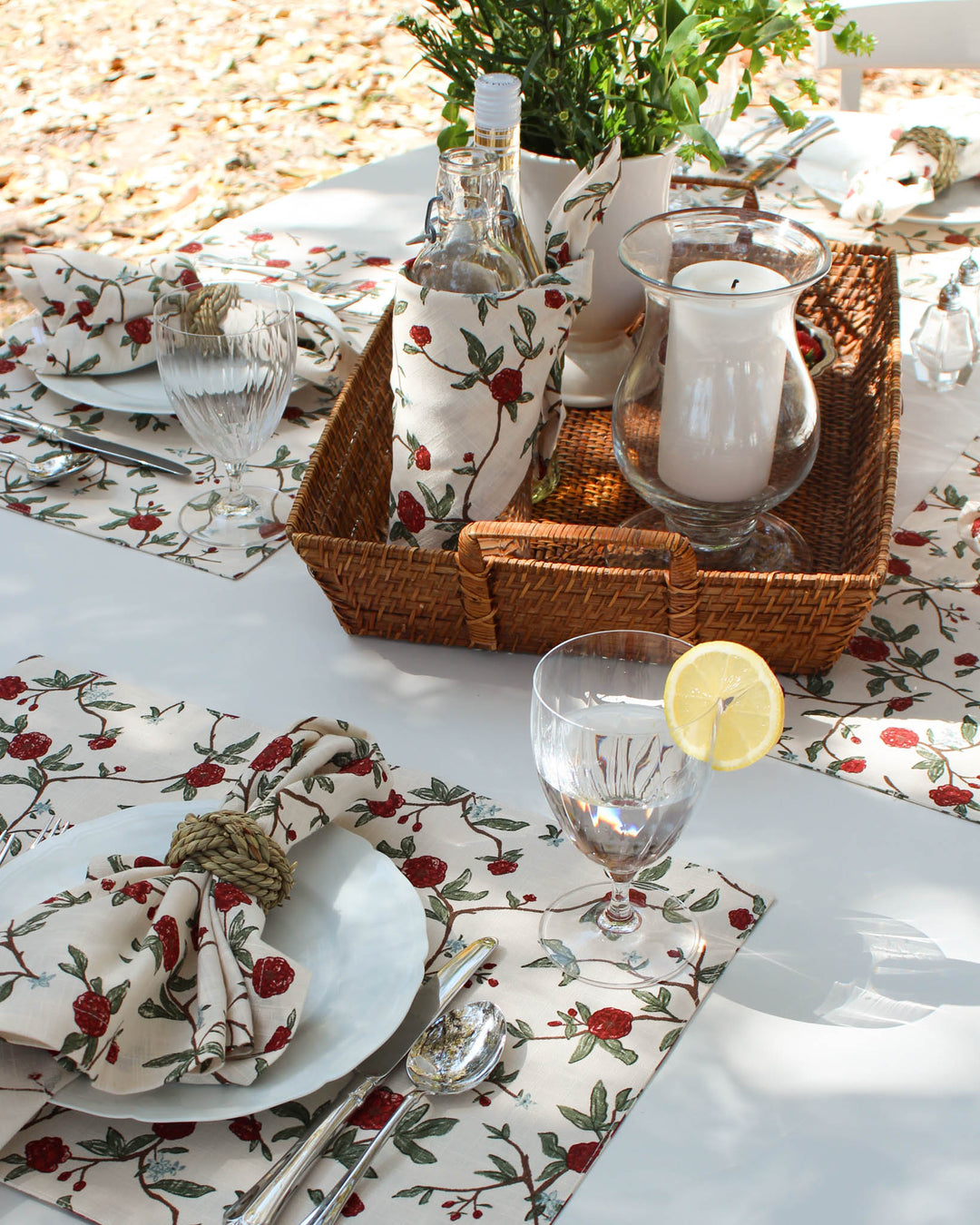 Give your garden party a fresh spring update with these red and green floral cloth placemats. The vibrant botanical pattern is perfect for brightening up a dark wood or white table. These rectangle placemats measure 14.5 by 20 inches, offering a generous size for your place settings. These washable cotton placemats are easy to maintain and keep looking new. Whether for a casual family dinner or a festive garden party, these reusable placemats add a cheerful touch to any meal.