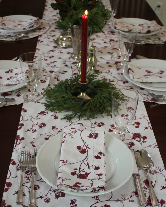 Set a perfect holiday table this season with our beautiful table runner in red floral design available in two sizes 