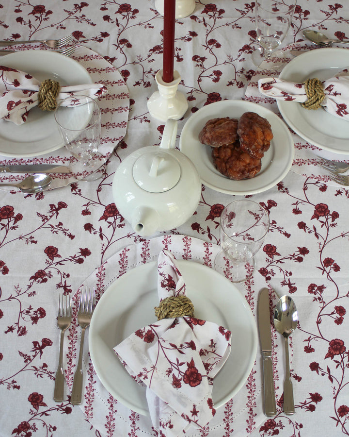 Elegant Rectangle Tablecloth with a sophisticated Toile Tablecloth influence. This Red Floral Tablecloth comes in 66x104 or 66x120 inches, fitting large tables for Easter Table Decor. A versatile Linen Tablecloth alternative that elevates any Mother's Day Brunch. The red flowers are hand-drawn for a unique artisanal touch. Pair this Floral Tablecloth with pearl napkin rings to create a seamless, high-end look for your Grand Millennial Decor tablescape.