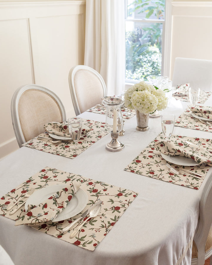 Celebrate your next party with these red and green floral cotton placemats. These rectangle placemats are ideal for a Mother's Day brunch  or a summer tea. The detailed floral print adds an elegant touch to your wedding decor or bridal shower. These reusable placemats are made from premium cotton, ensuring they feel soft to the touch. These washable placemats are easy to store and reuse for every spring occasion, bringing a consistent and beautiful look to your festive table settings.
