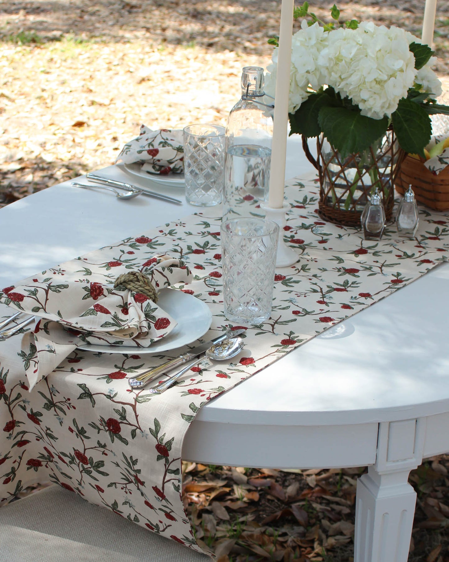 Elegant long floral table runner, crafted from soft organic cotton with a classic floral pattern. Featuring red flowers, green leaves, and blue details, this stunning runner adds timeless charm to spring, Easter, and summer tablescapes. 