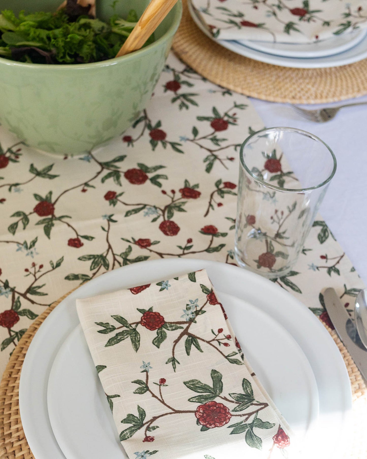 Hand-drawn table runner in floral print with matching napkins for tablescape.