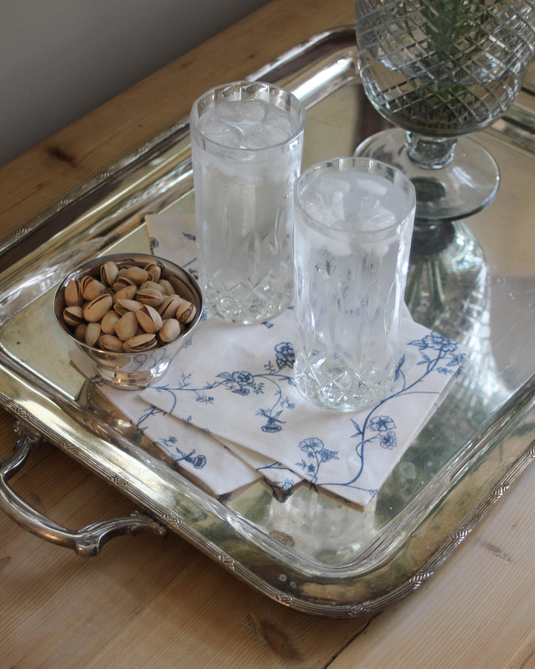 Set of 4 Garden Vine cotton cocktail napkins in a blue and white floral print, perfect for summer hosting, drinks, and Southern living style gatherings.