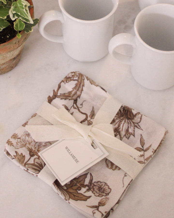 Set of 4 brown floral cocktail napkins, reusable cotton napkins for drinks, small bites, and everyday gatherings.