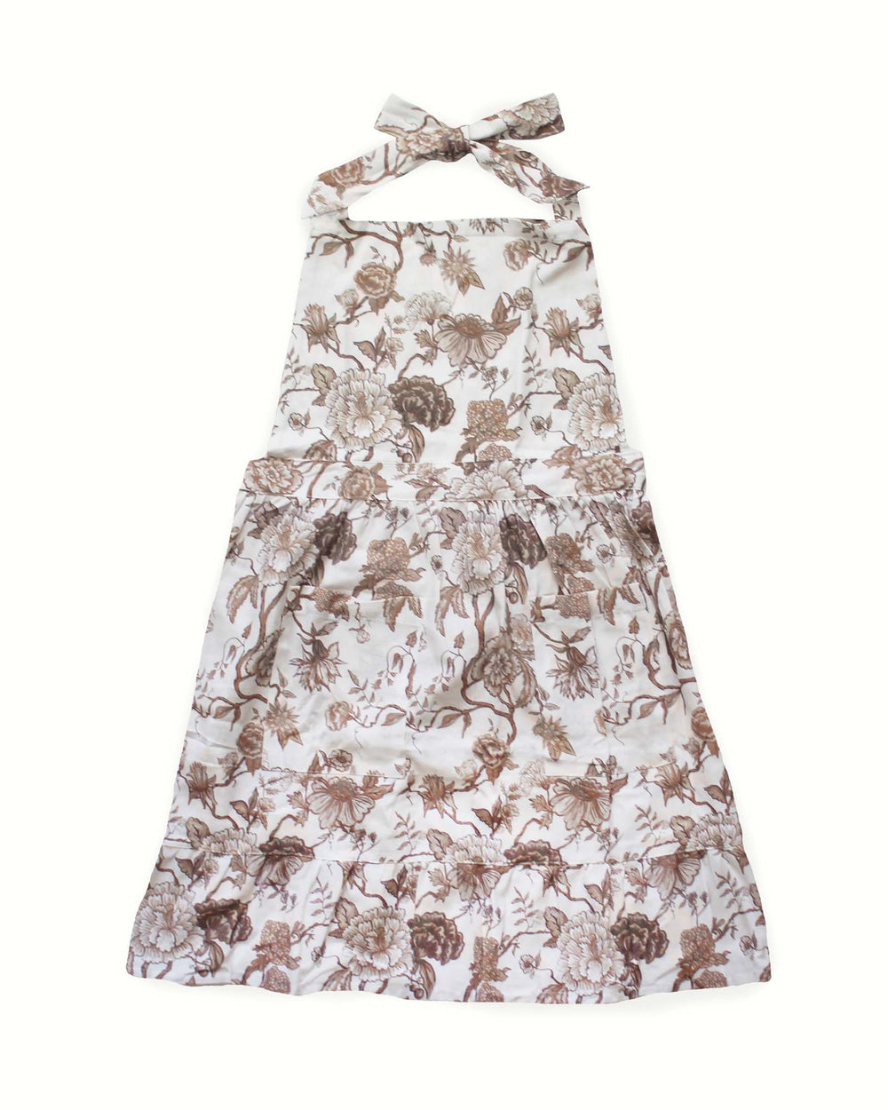 Warm chestnut brown floral smock apron with a ruffle hem and 100% cotton construction, perfect for a country kitchen aesthetic. This apron dress includes two practical pockets and adjustable ties, making it a versatile baking apron for women. Ideal for spring summer entertaining, it works as a gardening apron, BBQ apron, or grilling apron. An excellent Mother's Day gift for mom or an Easter hostess gift, this smock apron is built for making memories and holiday gift giving for her.