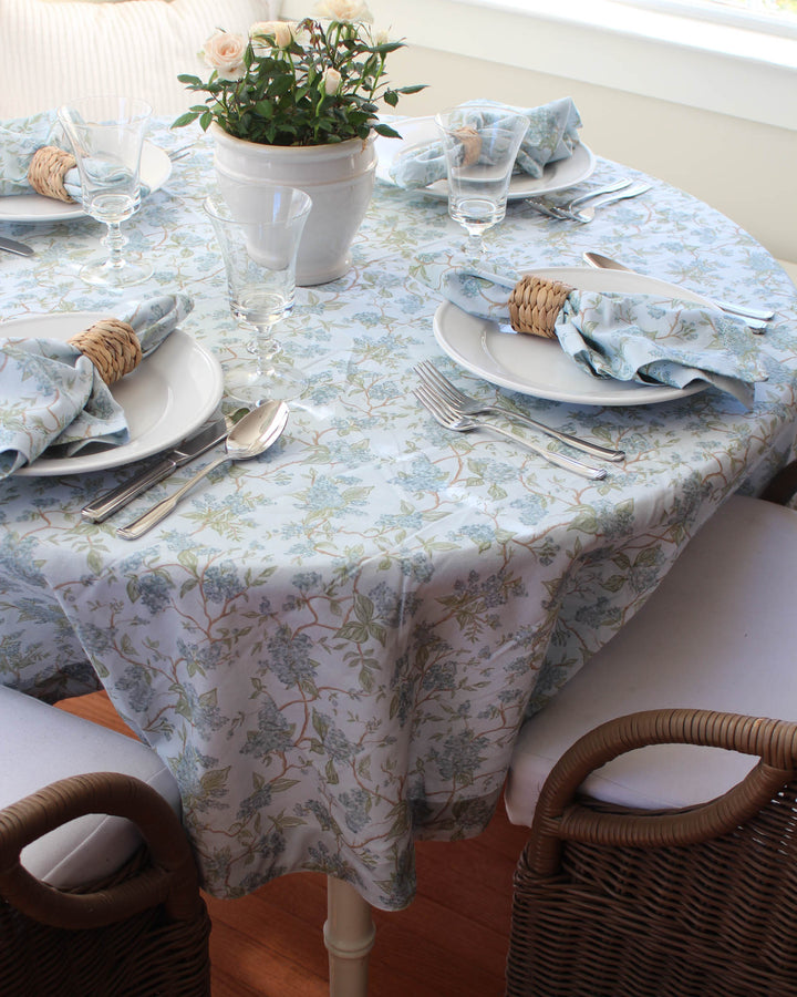 Floral cotton tablecloth in blue tones, perfect for hosting, dining, and seasonal table styling.