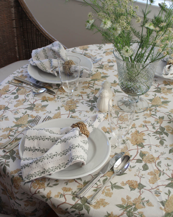 Floral cotton napkins with hemstitch detail, perfect for everyday use and thoughtful hosting.