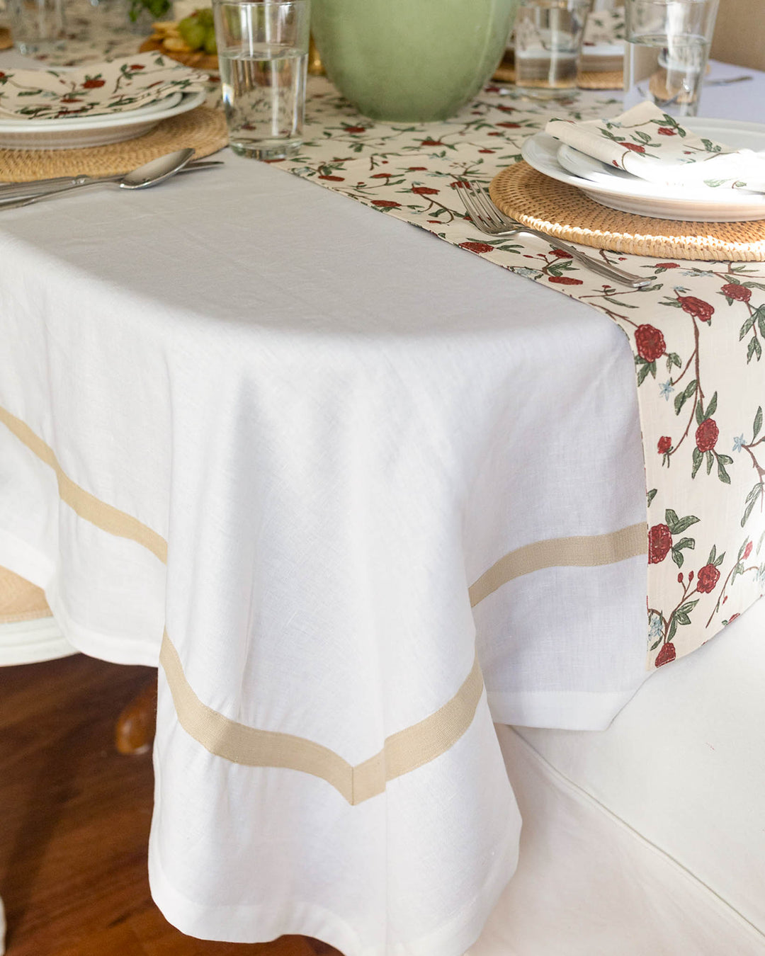 Elevate your Easter table decor with this stunning red and green floral table runner. The classic botanical design, inspired by heritage textile art, features hand-drawn blooms and dense foliage perfect for holiday hosting. Made from soft 100% organic cotton, it adds a sophisticated and earthy layer to your Easter Sunday lunch. Pair it with coordinating linens for a seamless, polished look. A beautiful choice for a traditional family gathering that values quality and craftsmanship.