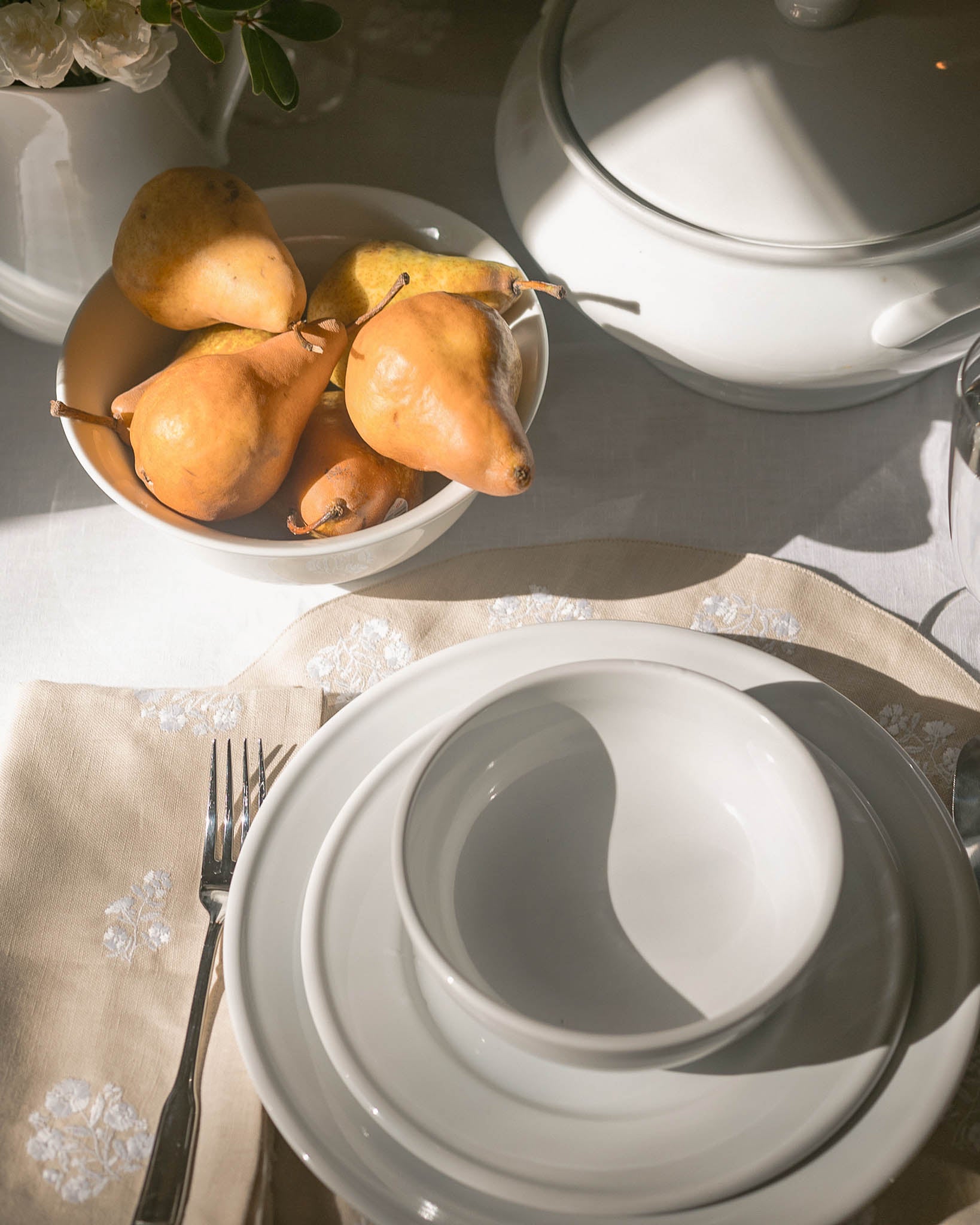 Heirloom, vintage inspired table linens with floral embroidery. Perfect for Thanksgiving tablescapes and Fall wedding table decor.