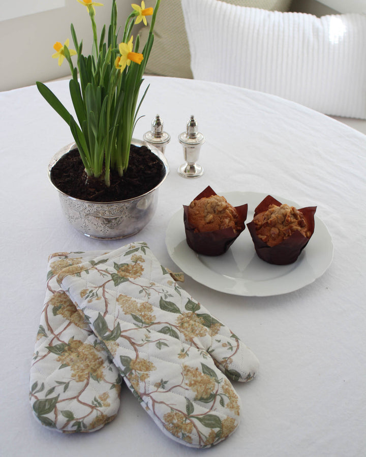 Quilted floral kitchen gloves with heat protection, designed for cooking, baking, and hosting gatherings.