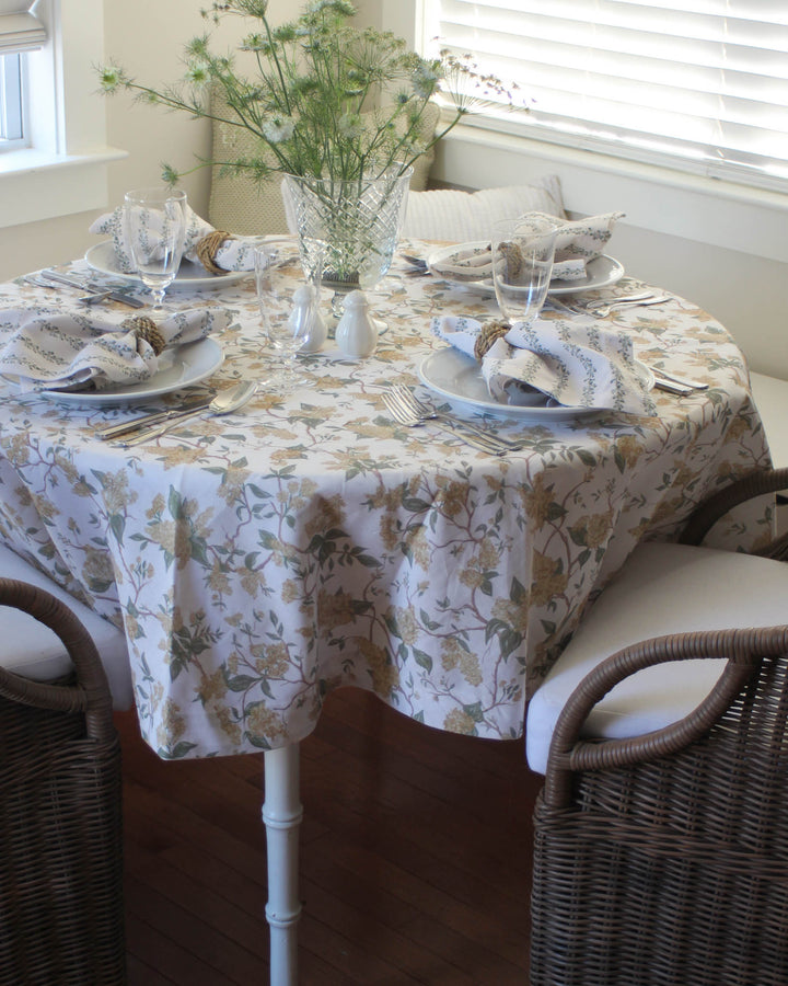 Marigold Floral Round Tablecloth available in 70" round size. Perfect for bridal shower, tea party and brunches. 