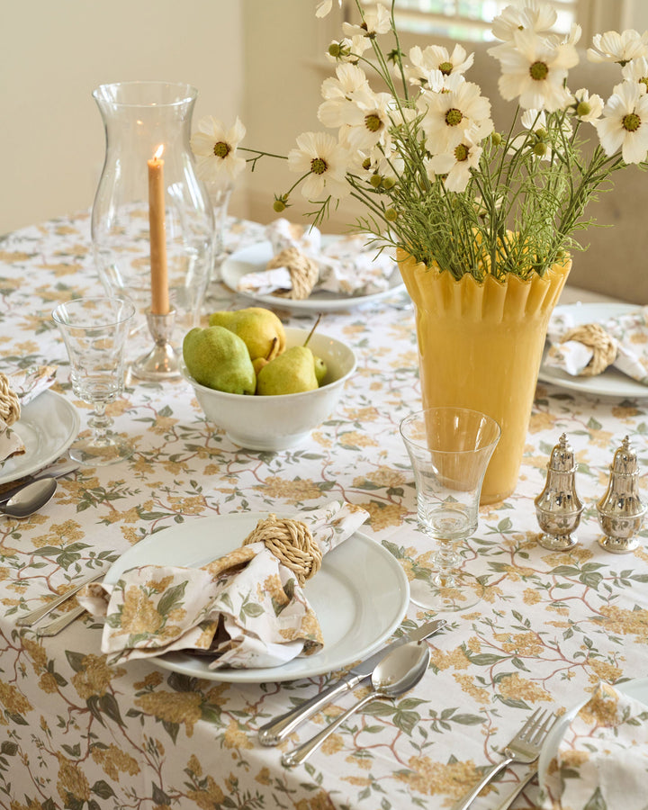 Classic yellow floral tablecloth made from cotton, ideal for elegant fall tables, family dinners, Thanksgiving gatherings, and warm seasonal entertaining.