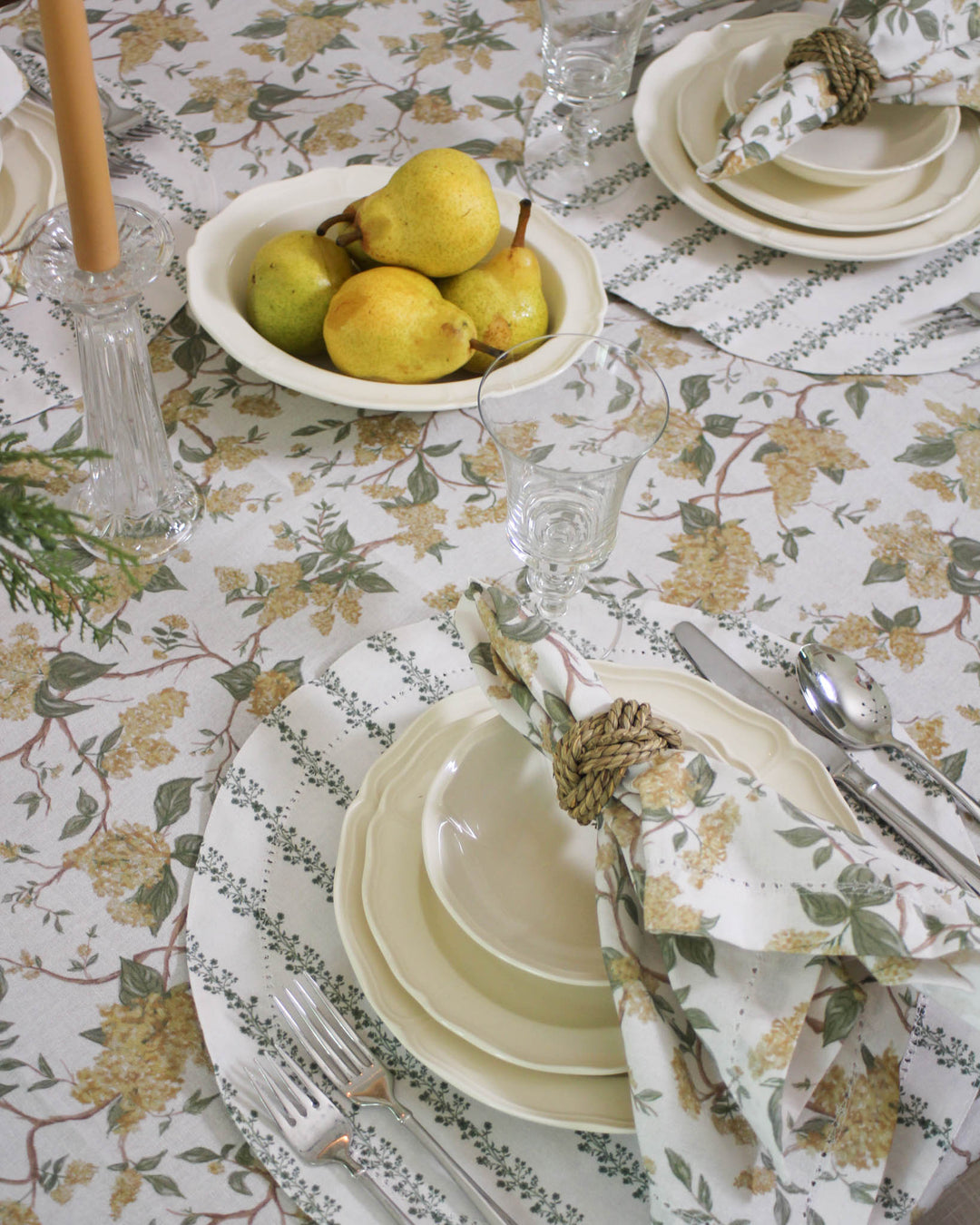 French Country Print rectangle tablecloth in a sunny Yellow Botanical Print. This Cotton Tablecloth is available in 66x104 and 66x120 inches, providing an elegant drape for your spring and summer tablescape. Perfect for Easter Table Decor and Easter Hostess Gift ideas. This Grand Millennial Decor piece is a top Mother's Day Gift for Mom, Sister, or Chef. Pair this Floral Cotton Table Cloth with coordinating linens for a festive dining space.