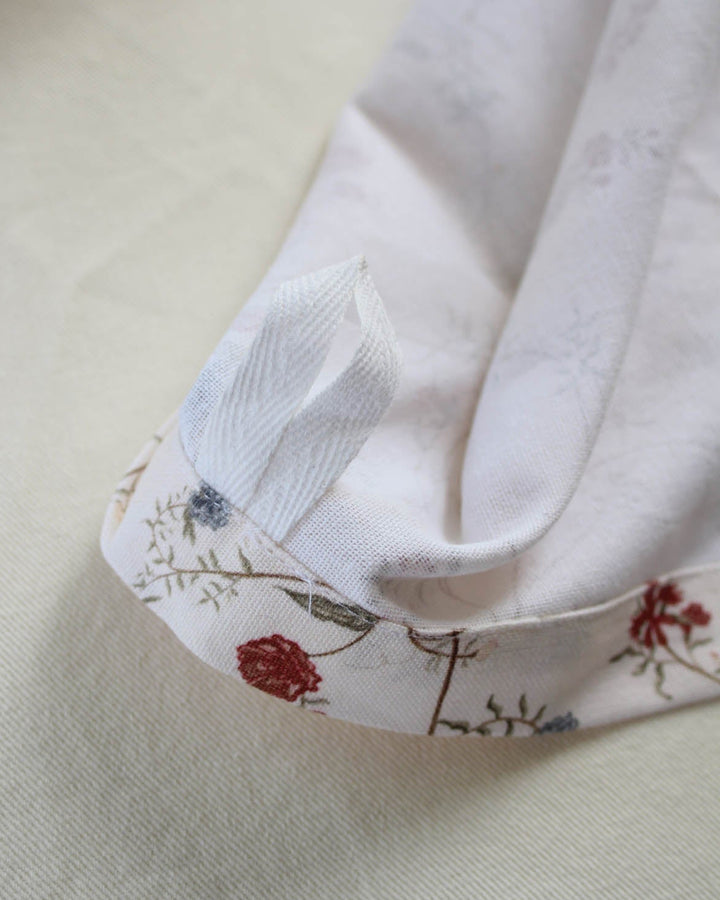 Classic cotton tea towel in a floral print, made for everyday kitchen tasks, thoughtful gifting, and effortless entertaining.