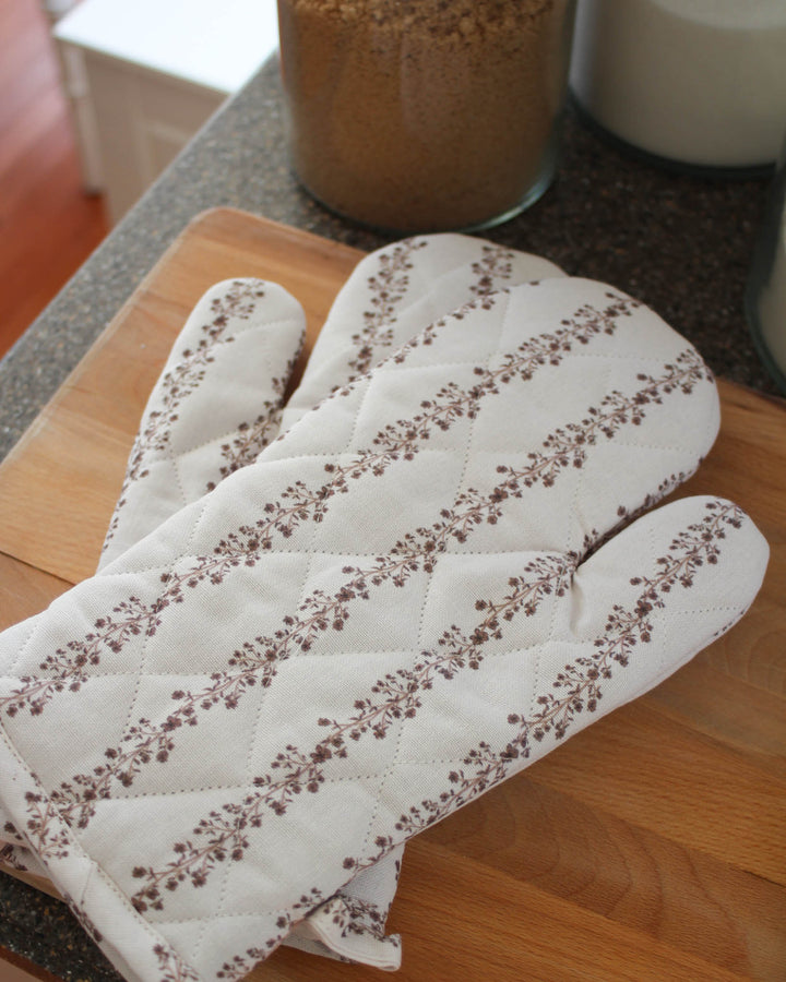 Floral cotton kitchen gloves designed for baking, serving, and everyday kitchen routines.