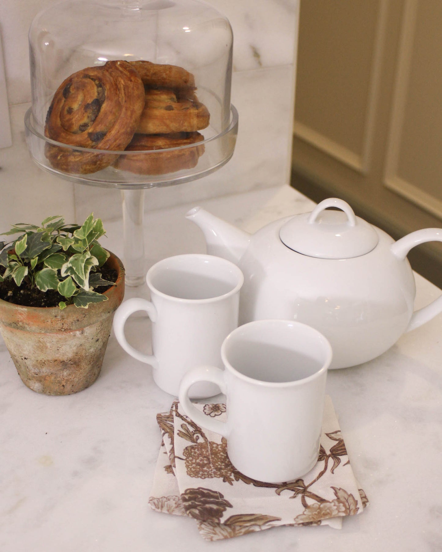 Versatile floral square napkins in brown floral print for small bites, drinks, and hosting