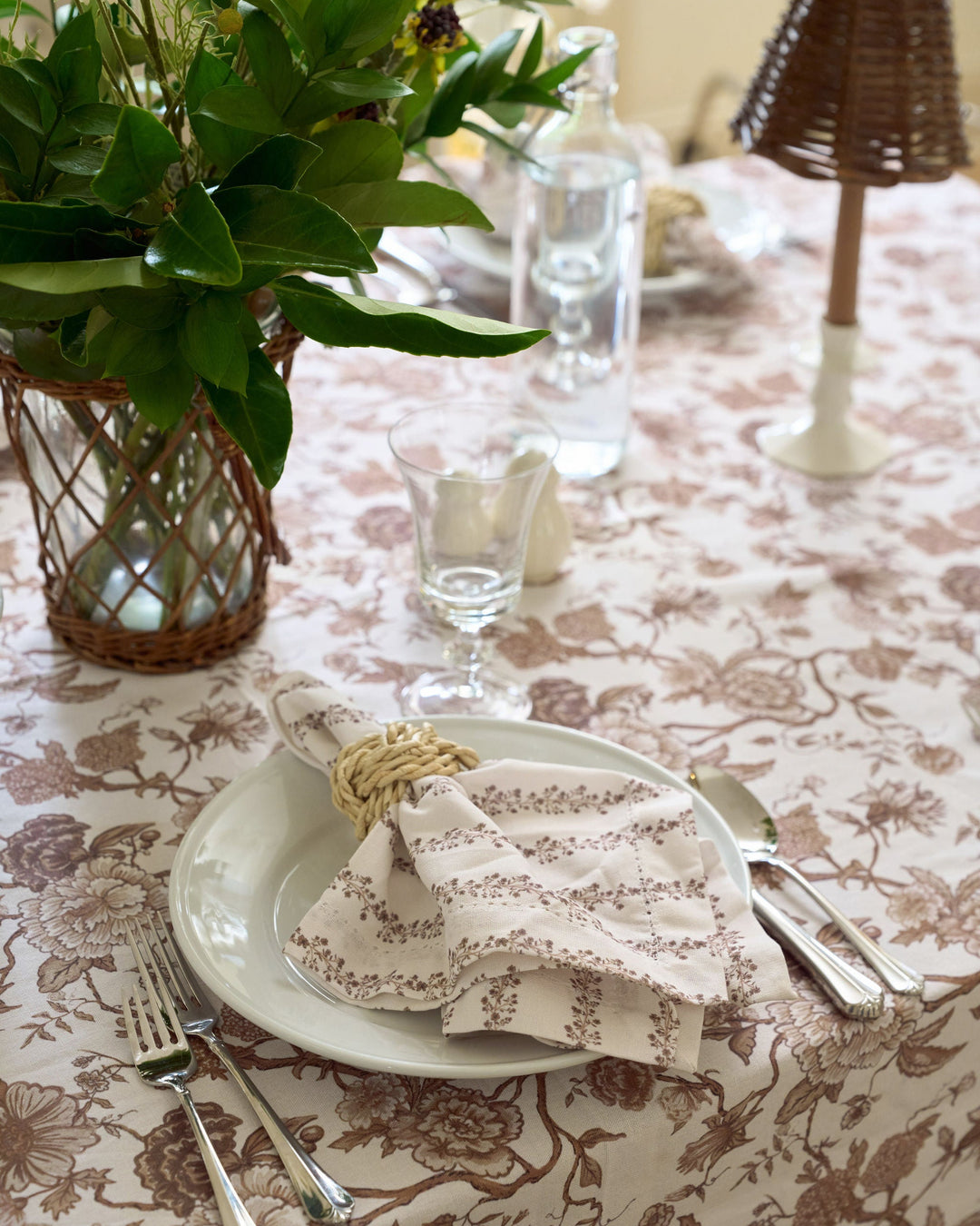Brown striped floral cloth napkins bring warmth and timeless style to a fall table setting, pairing beautifully with neutral dinnerware, natural textures, and seasonal Thanksgiving décor.