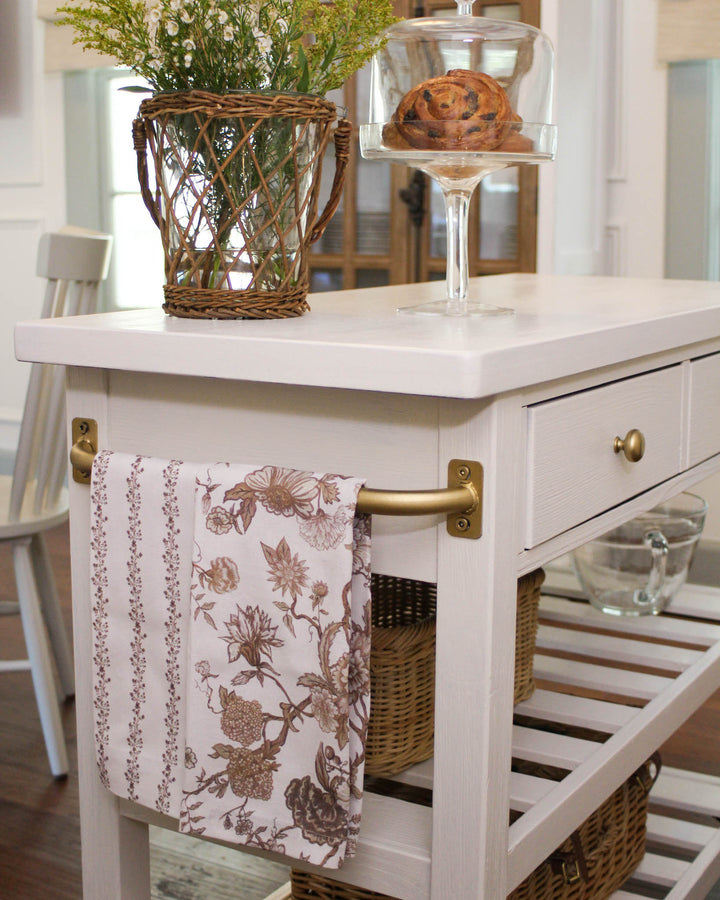 Brown botanical stripe tea towel with a vintage-inspired floral pattern, designed for cozy kitchens, fall decorating, and everyday use.