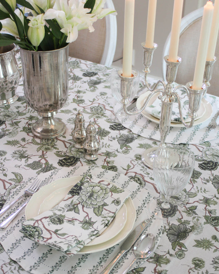 Florence cotton tablecloth in green floral design, styled for a light and airy coastal grandmother table setting.