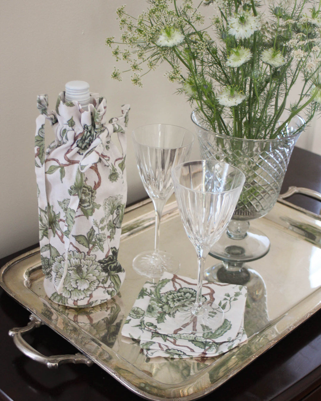 Floral cocktail napkins in premium cotton, a charming addition to bar carts and summer gatherings. Pair with matching wine bag for a perfect hostess gift set.