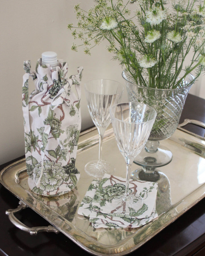 Floral cocktail napkins in premium cotton, a charming addition to bar carts and summer gatherings. Pair with matching wine bag for a perfect hostess gift set.