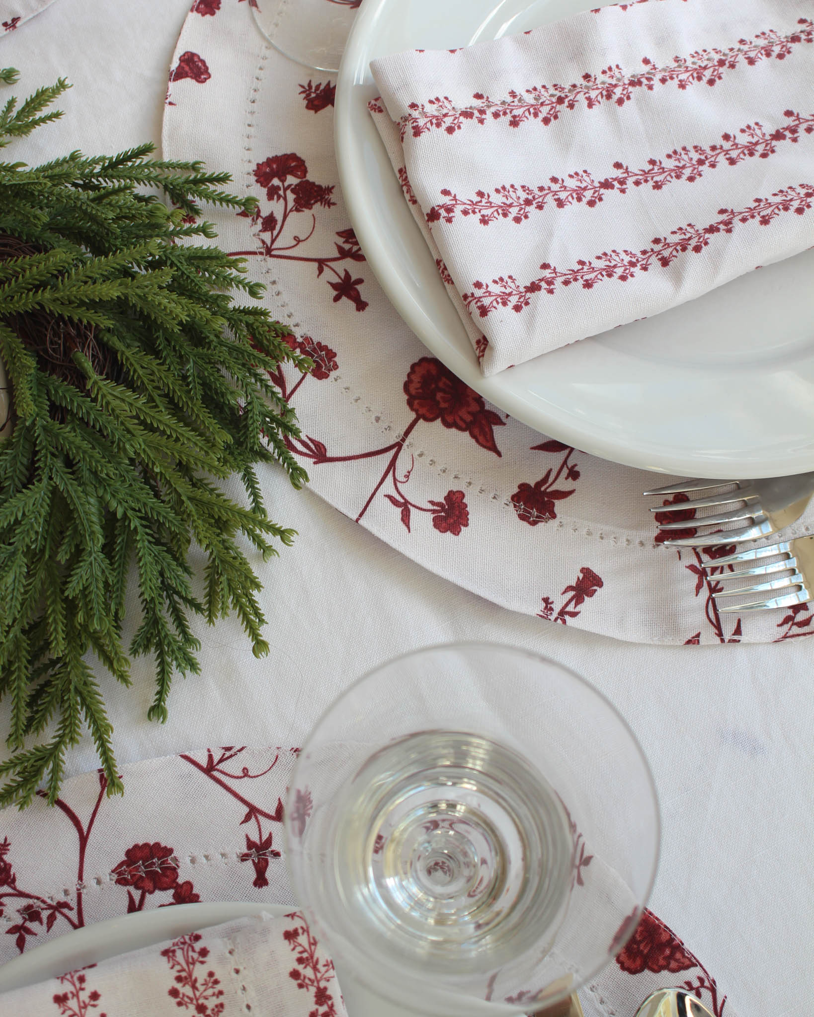 Sustainable cotton placemats with delicate hemstitch detail, ideal for Christmas hosting.