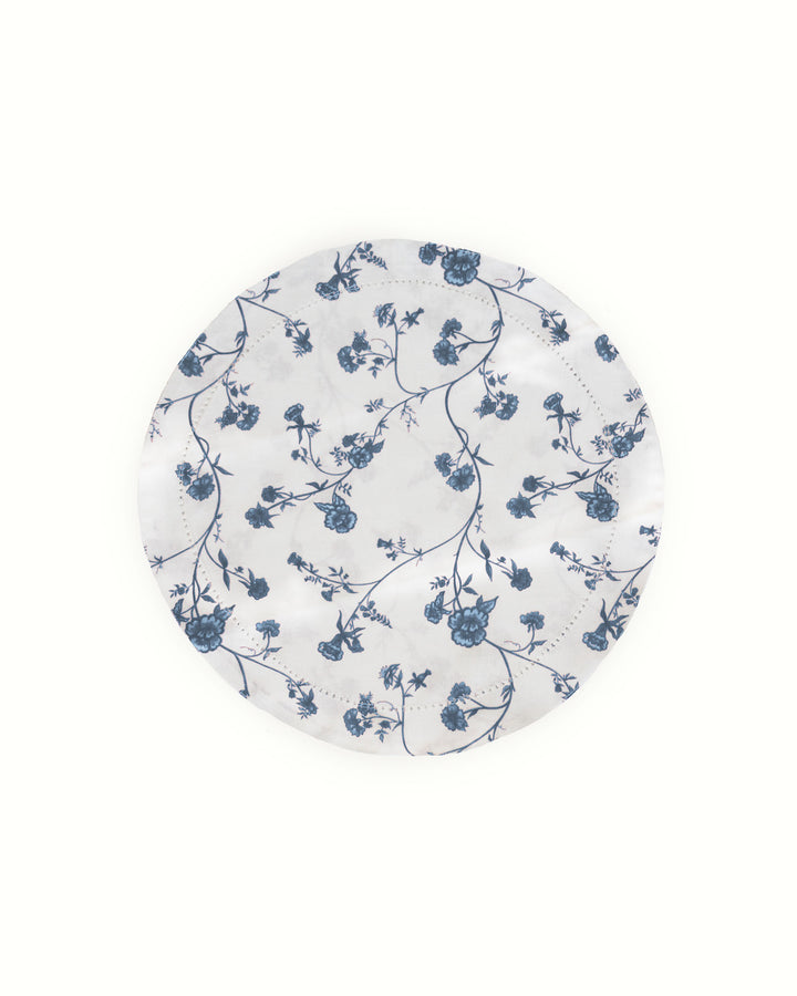 Set of 4 Garden Vine cotton placemats in a blue and white floral Delft-inspired print, designed as cloth chargers for layered table settings and summer hosting.