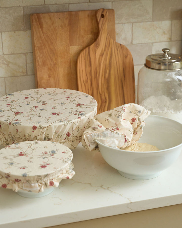 Antique Floral reusable cotton bowl cover set with three elasticized sizes and ruffle trim, designed for sourdough proofing, bread baking, short-term food storage, serving bowls, fall cooking, Thanksgiving preparation, Christmas baking, hostess gifts, and sustainable kitchen use.