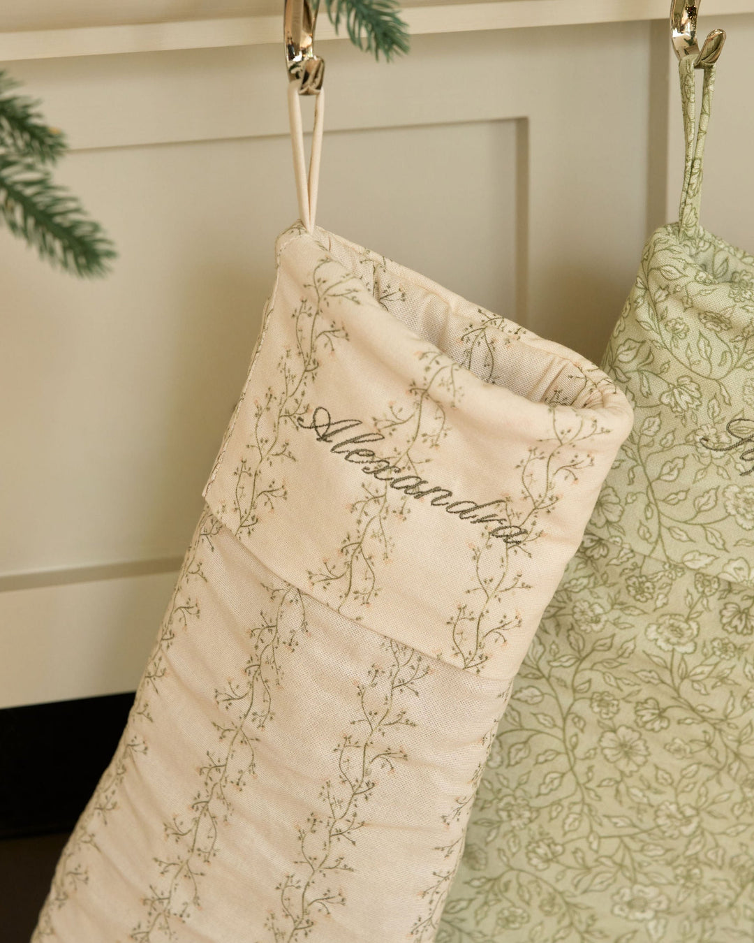 Meadow personalized Christmas stocking featuring a neutral floral stripe, custom monogram embroidery, classic holiday decor, and Christmas morning gift style.