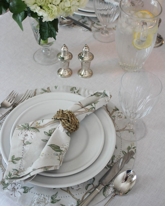 Hand-drawn Camellia floral fabric placemats in timeless beige and green for elegant summer tablescape or Mother's Day gift.