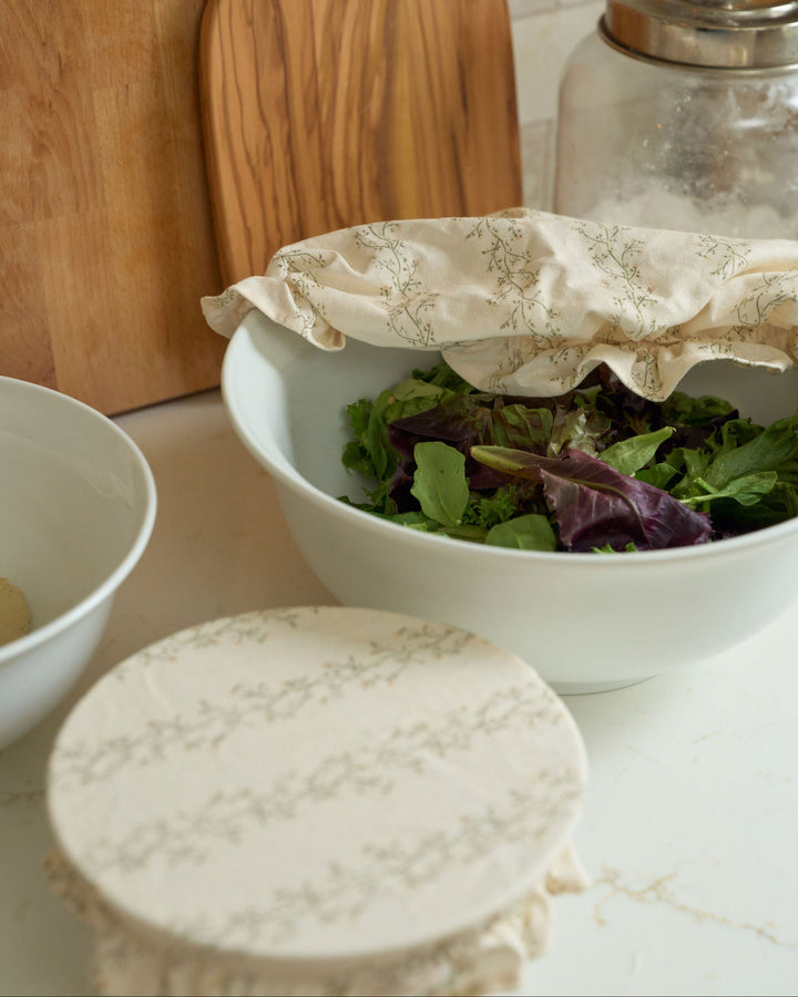Floral cotton bowl cover set with three practical sizes, secure elastic edges, and ruffle trim for mixing bowls, serving dishes, sourdough starters, homemade bread, everyday meal preparation, seasonal entertaining, wedding gifts, baker gifts, hostess gifts, and reusable kitchen storage.