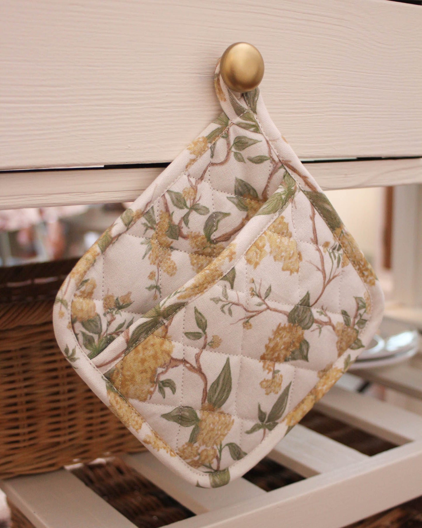 Set of two durable floral potholders with hanging loops