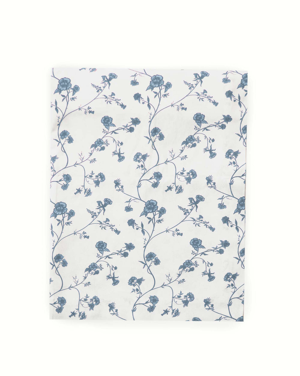 Floral patterned tablecloth with blue flowers on a white background