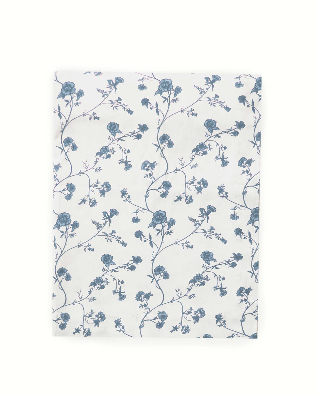 Floral patterned tablecloth with blue flowers on a white background