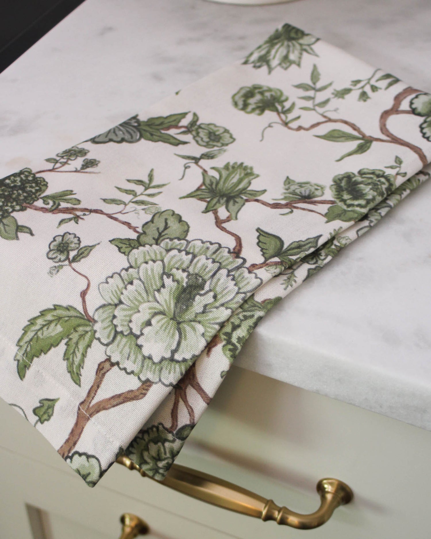 Sustainable green floral cotton towel for everyday cooking and holiday hosting