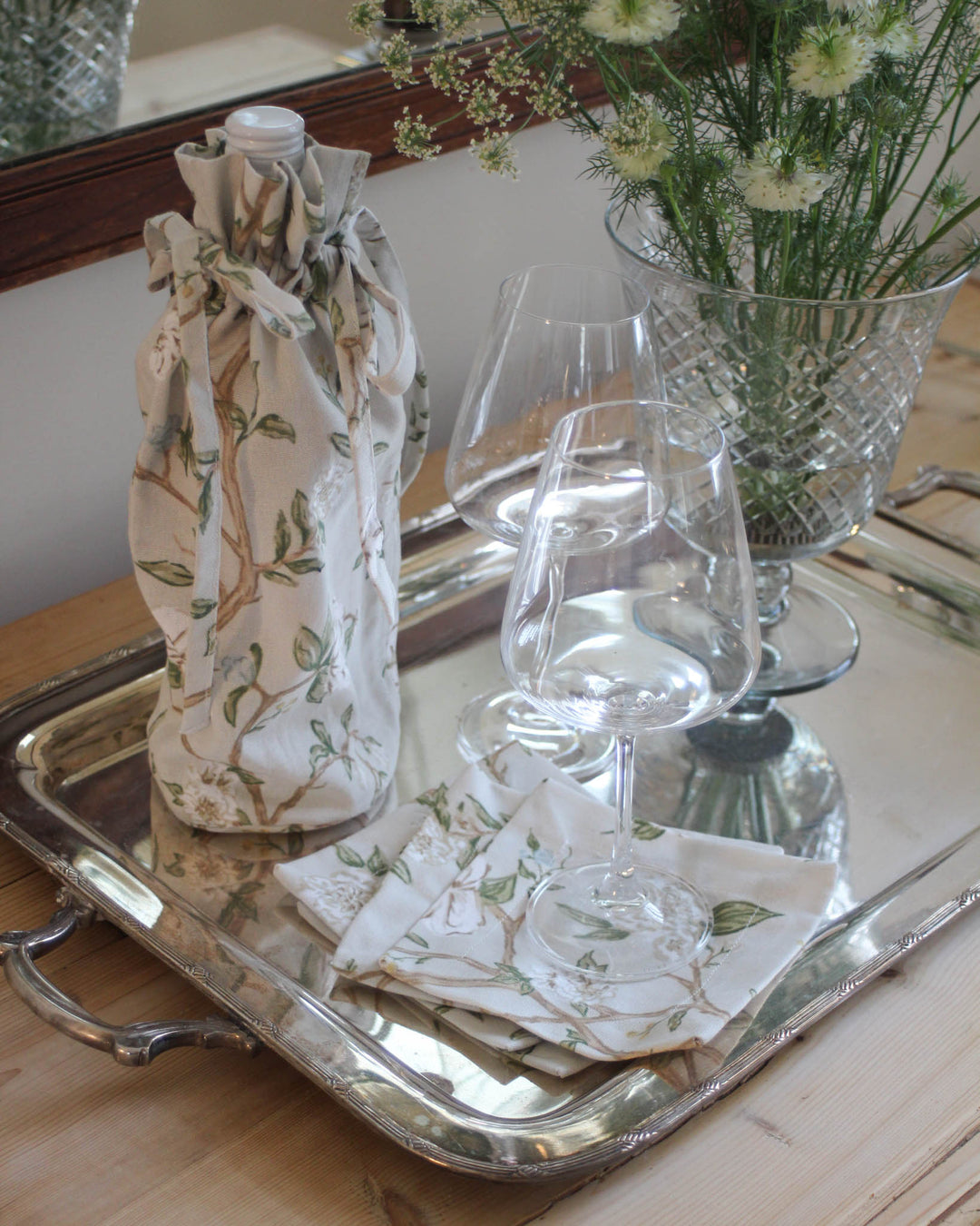 Reusable floral wine bag styled for Southern living gatherings and thoughtful hostess gifting.