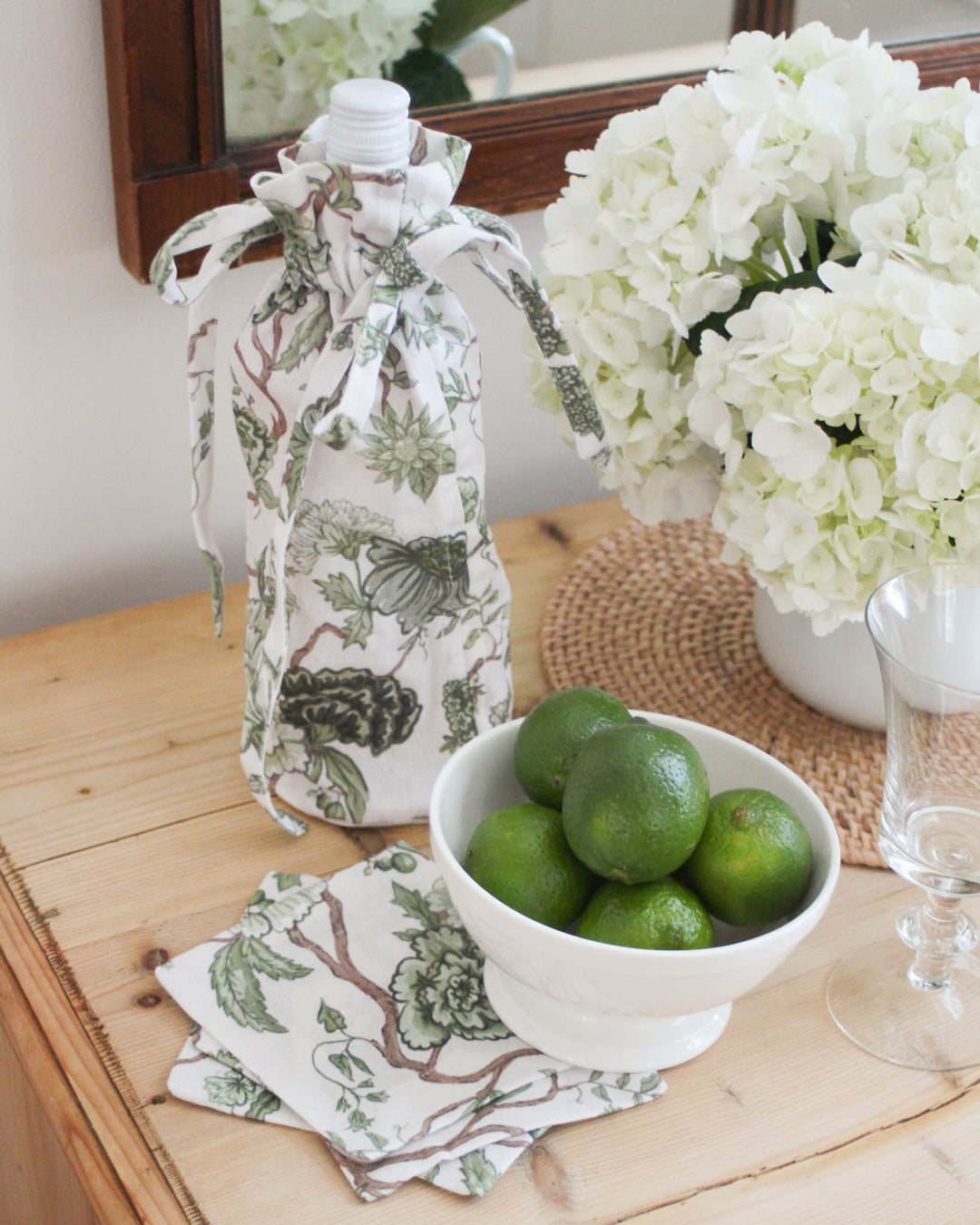 Personalized floral cocktail napkins with monogram option, a thoughtful bridal or hostess gift for entertaining. Pair with a matching wine bag for a perfect gift set.