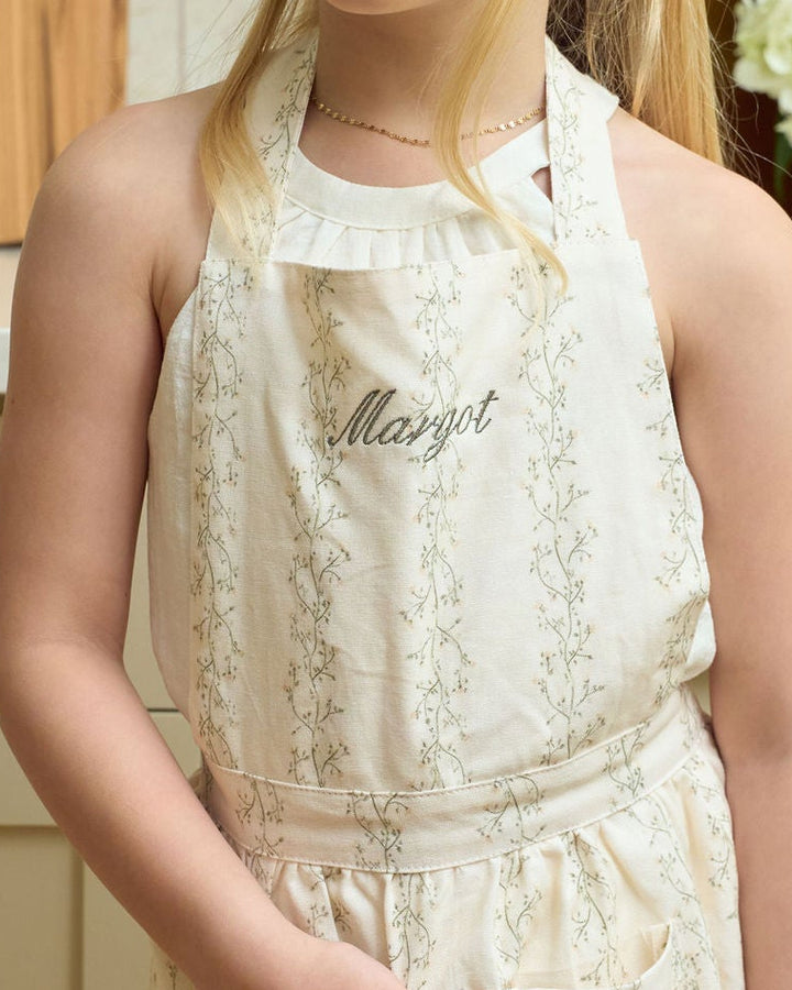 Custom monogram kids baking apron in a classic botanical print, perfect for personalized Christmas gifts, mommy-and-me kitchen sets, holiday cookie parties, and seasonal family traditions.