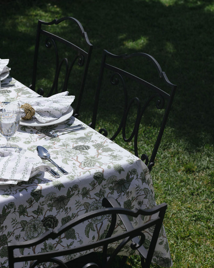 Premium cotton Florence tablecloth with hand-drawn green floral print, bringing effortless elegance to everyday table settings for the summer season 