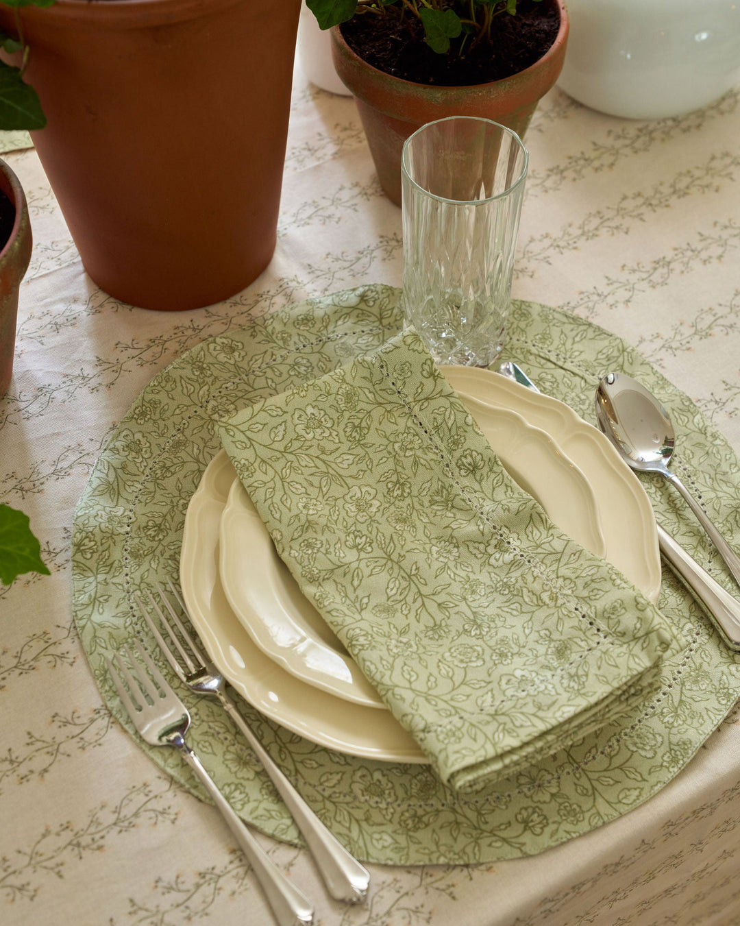 Green botanical cotton placemats in a soft sage floral pattern for fall gatherings, holiday dinners, spring entertaining, and everyday dining.