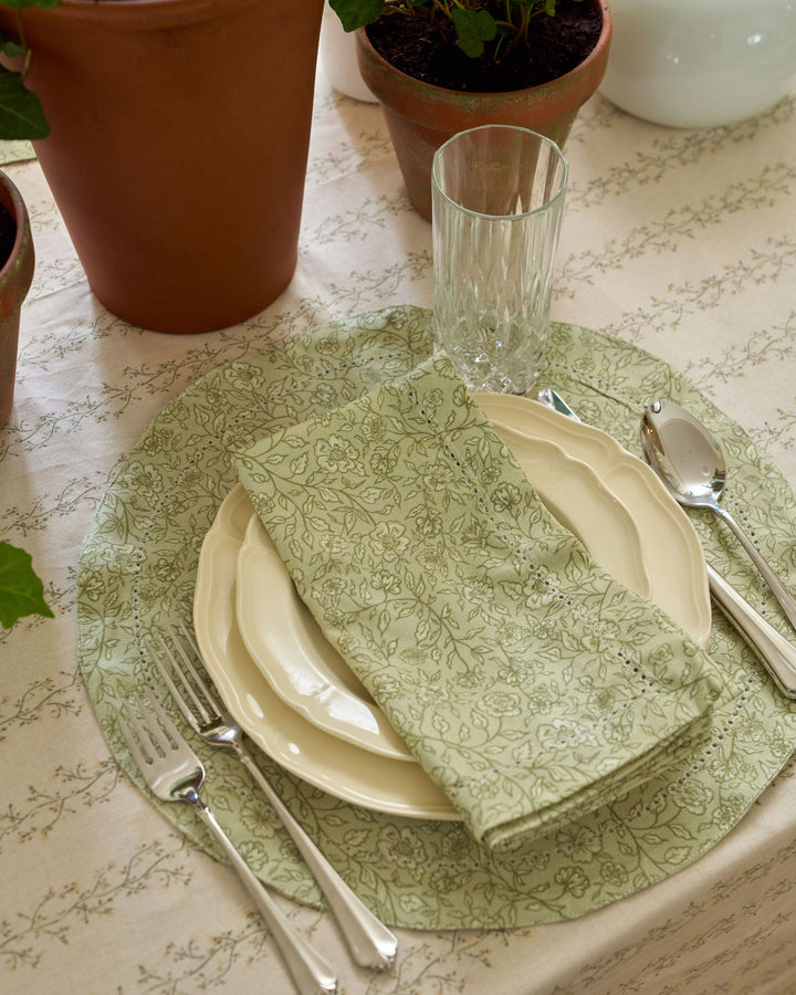 Green botanical cotton placemats in a soft sage floral pattern for fall gatherings, holiday dinners, spring entertaining, and everyday dining.