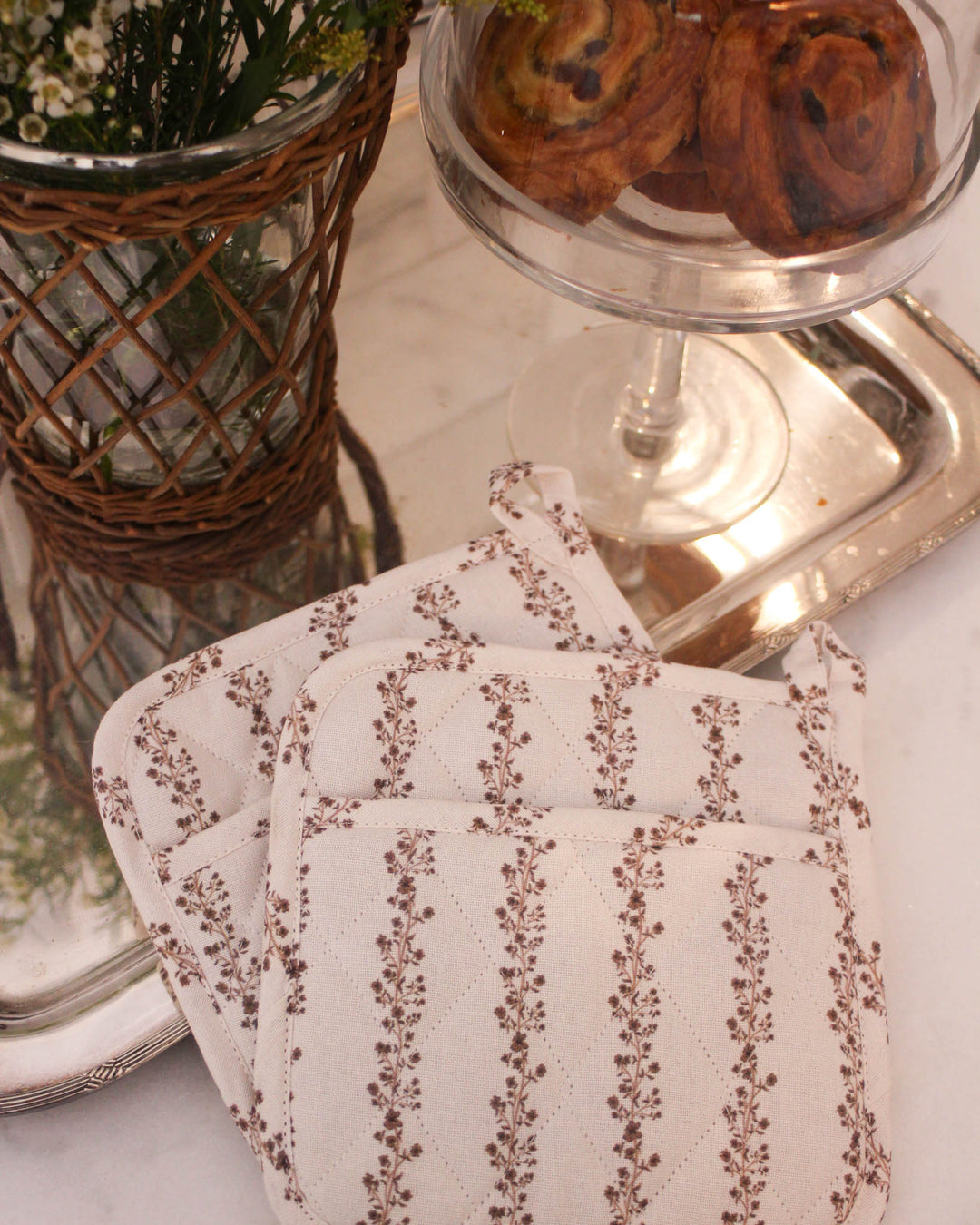 Floral cotton pot holder set designed for everyday cooking, hosting, and warm, inviting kitchens.