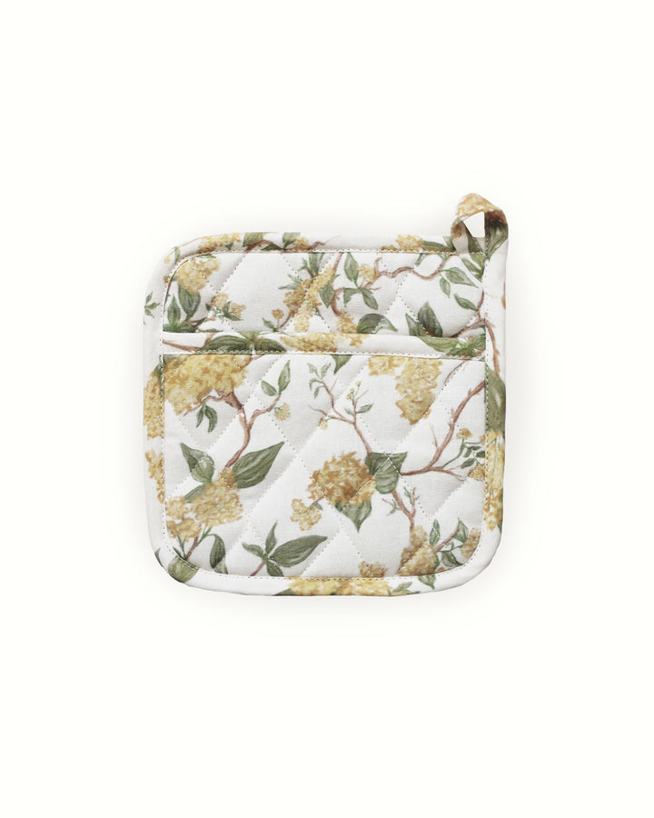 Add a bright pop of color and protection to your cottage core kitchen with these yellow botanical floral potholders. This set of two quilted hot pads is made from durable cotton with a heat-resistant fill, perfect for spring baking or Easter holiday hosting. Each 8-inch square potholder features intricate diamond stitching for extra strength and a handy hanging loop for easy storage. These stylish yellow floral hot pads double as trivets, making them a practical and charming gift choice.
