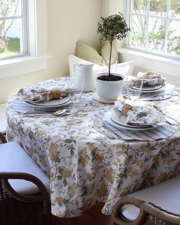 Treat Mom to a vibrant table setting with these yellow flower napkins, an ideal Mother's Day gift for those who love to host. This set of 4 linens features a vintage country table decor vibe updated with a modern botanical twist. The 20" x 20" size is perfect for layering over white napkins for a texture-on-texture garden look. These hand-drawn yellow floral and vine prints create a warm, inviting atmosphere that celebrates the new life and sunshine of the spring season.